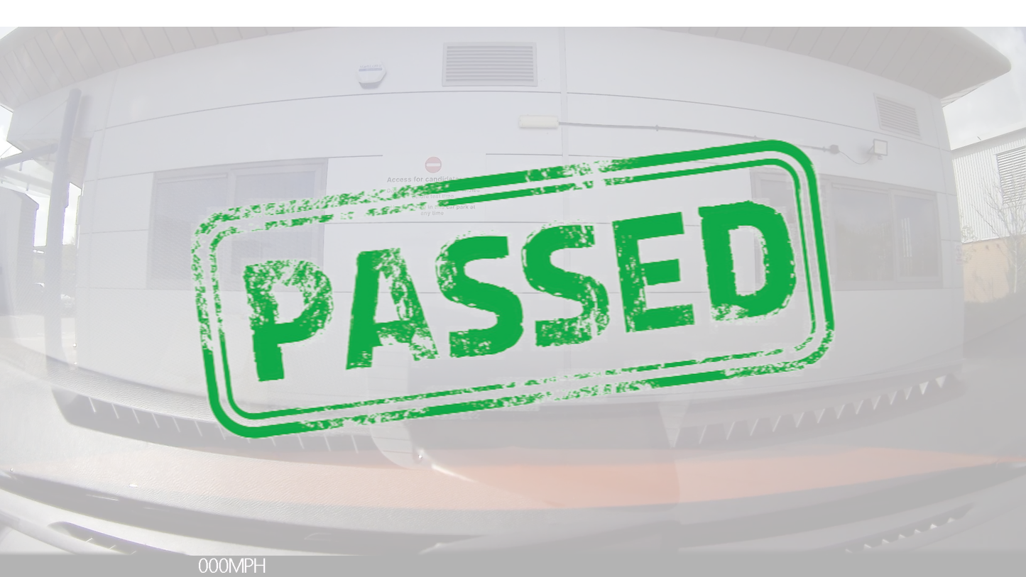 Car dashboard with a green 'PASSED' stamp