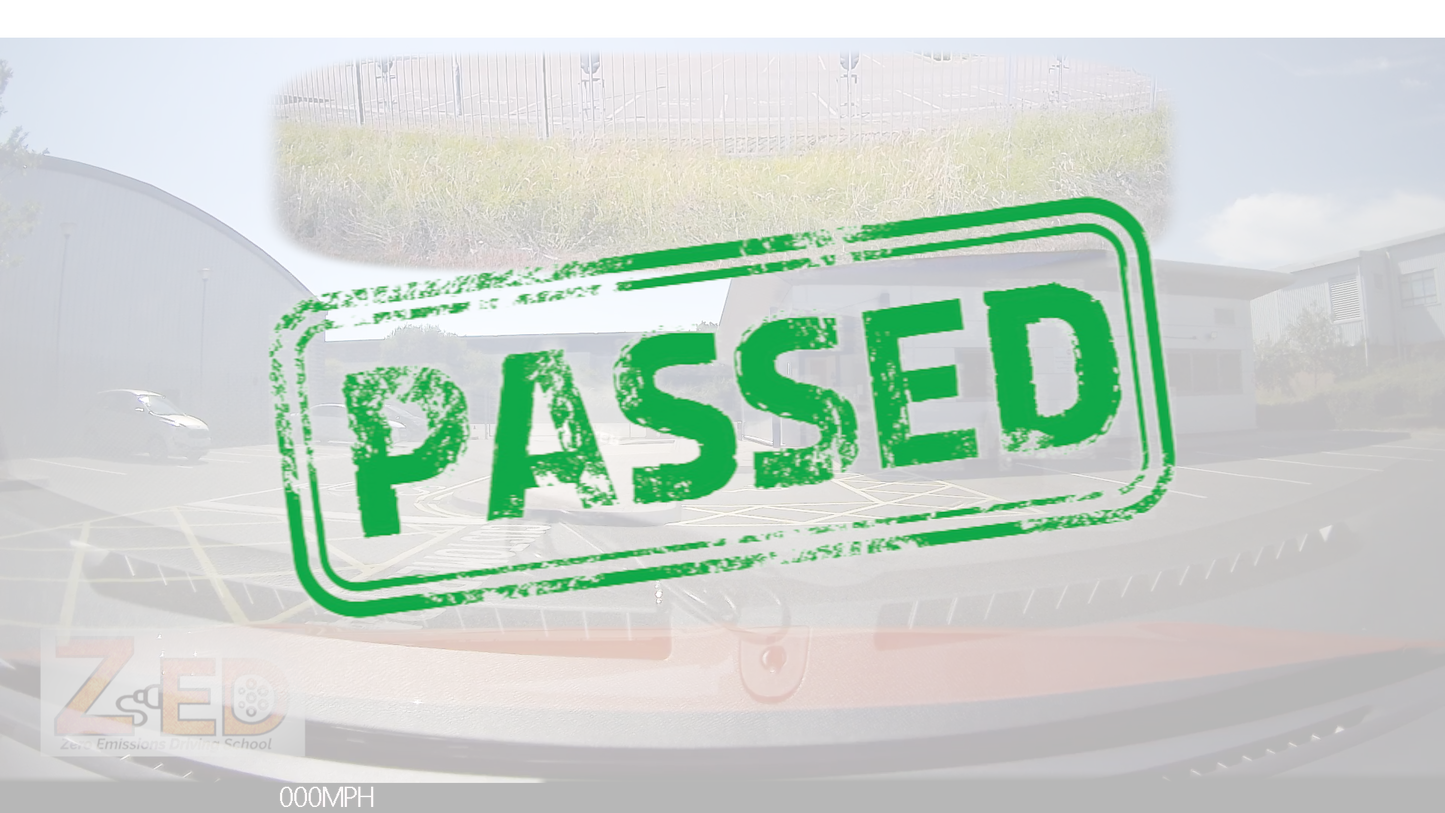 A green distressed rubber stamp graphic with the word 'PASSED' in bold uppercase letters, overlaid on a faded background of a car and outdoor scenery.