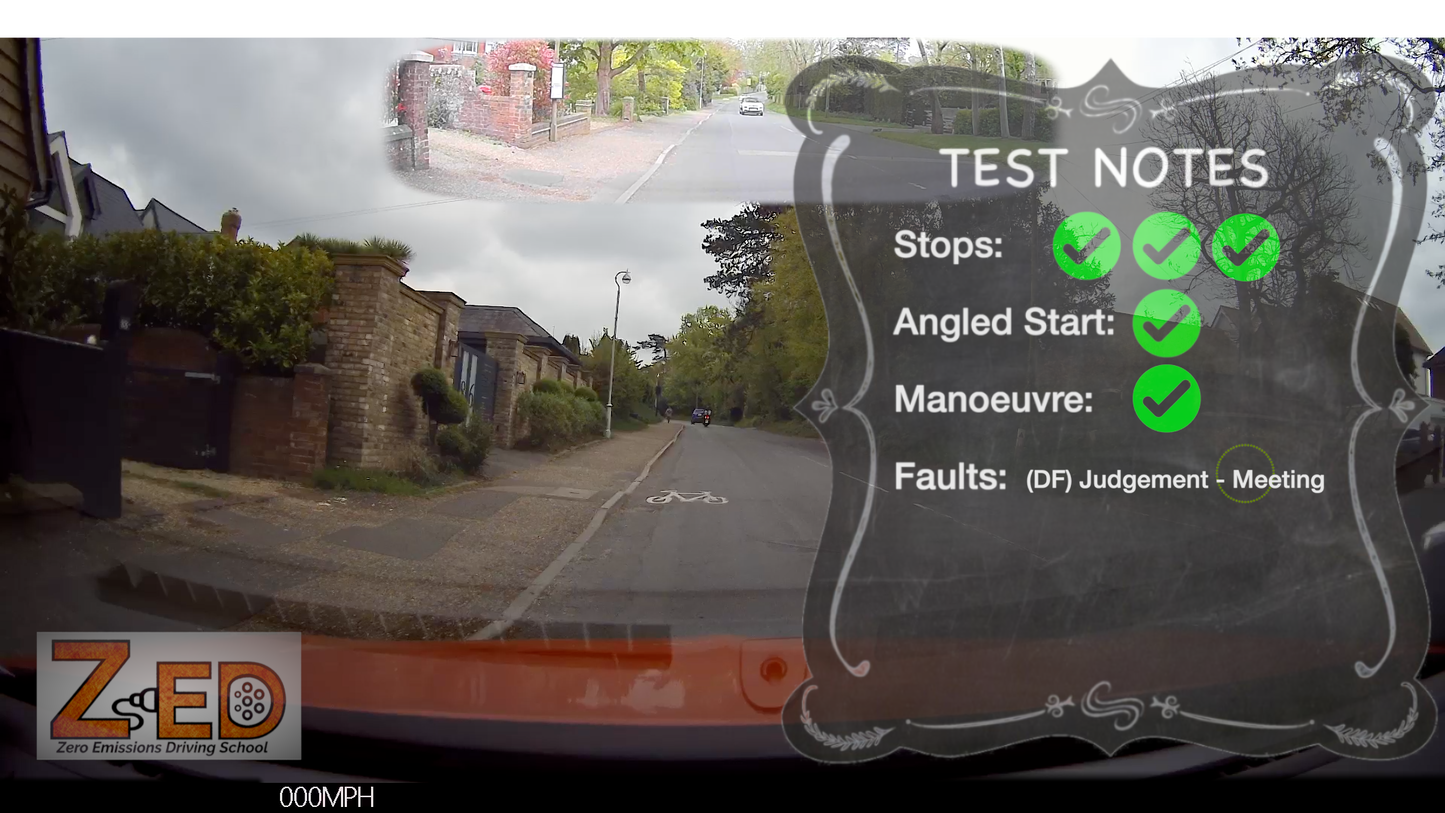 Driving test screen with road view and test notes on a cloudy day.