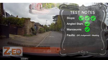 Driving test screen with road view and test notes on a cloudy day.