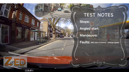 Driving test screen with a street scene and 'ZED' branding.