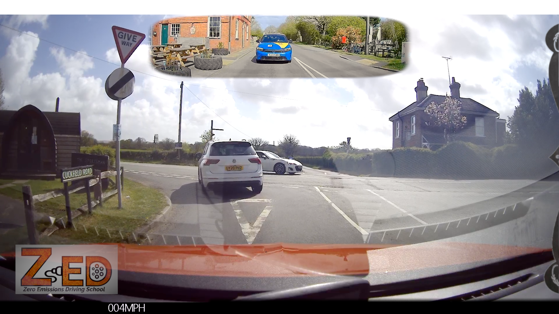 Multiple views of a car driving on a road with a 'ZED' logo in the corner.