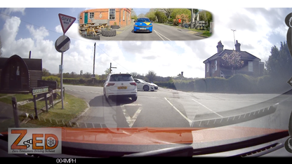 Multiple views of a car driving on a road with a 'ZED' logo in the corner.