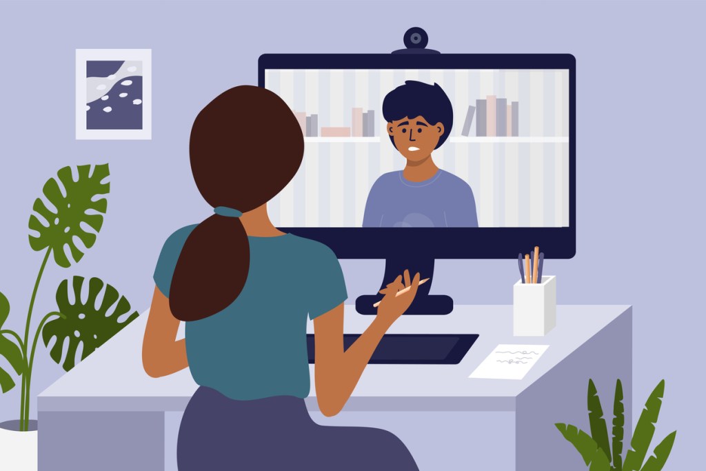 A graphic showing a video call, with one person sitting at a desk and the other shown on the computer monitor